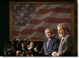 President George W. Bush listens intently to remarks by President Luiz Inacio Lula da Silva of Brazil during a joint press availability Friday, March 9, 2007, in Sao Paulo. White House photo by Eric Draper