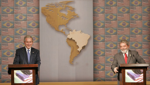 President George W. Bush and Brazil's President Luiz Inacio Lula da Silva smile as they field questions from reporters Friday, March 9, 2007, during a joint press availability in Sao Paulo. White House photo by Paul Morse