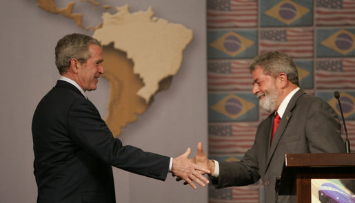 President George W. Bush and Brazil's President Luiz Inacio Lula da Silva shake hands Friday, March 9, 2007, after a joint press availability in Sao Paulo. The two leaders met for the day and discussed many topics, including biofuels, energy, and international affairs. White House photo by Paul Morse