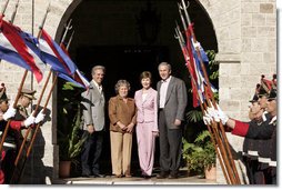 President George W. Bush and Mrs. Laura Bush stand for photos Saturday, March 10, 2007, with President Tabare Vazquez of Uruguay and his wife, Mrs. Maria Auxiliadora Delgado de Vazquez at Estancia Anchorena. The President and Mrs. Bush will overnight in nearby Montevideo before continuing on to Colombia for the fourth stop of their five-country, Latin American visit. White House photo by Paul Morse