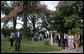 Mrs. Laura Bush and Mrs. Maria Auxiliadora Delgado de Vazquez smile and wave at well-wishers as they conclude a walking tour Saturday, March 10, 2007, of historic Colonia del Sacramento. While their husbands – President George W. Bush and President Tabare Vazquez – assumed different schedules, the two women took the opportunity to talk about youth, health and education issues. White House photo by Shealah Craighead