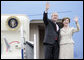 President George W. Bush and Mrs. Laura Bush wave from Air Force One Sunday, March 11, 2007. President Bush traveled from Uruguay to Bogot, Colombia, where he was honored by an arrival ceremony at Casa de Narino. White House photo by Eric Draper