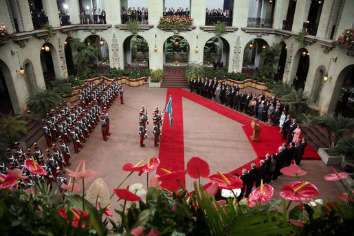 President George W. Bush and Mrs. Laura Bush stand with President Oscar Berger and Mrs. Wendy Widmann de Berger during the arrival ceremonies Monday, March 12, 2007, in Guatemala City. White House photo by Paul Morse