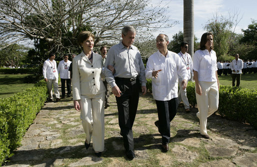 President George W. Bush and Mrs. Laura Bush walk with Mexico's President Felipe Calderon and Mrs. Margarita Zavala upon their arrival Tuesday, March 13, 2007, to Hacienda Temozon in Temozon Sur, Mexico. White House photo by Eric Draper