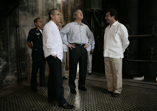 President George W. Bush and President Felipe Calderon of Mexico participate in a walking tour of the Hacienda Temozon Tuesday, March 13, 2007, in Temozon Sur, Mexico. White House photo by Eric Draper