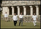 President George W. Bush and President Felipe Calderon walk amid the Mayan ruins of Uxmal Tuesday, March 13, 2007, during the visit by the President and Mrs. Laura Bush to Mexico. White House photo by Paul Morse