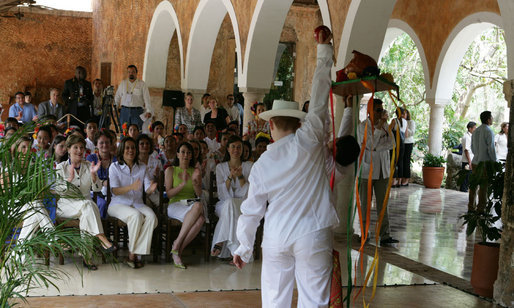 Mrs. Laura Bush and Mrs. Margarita Zavala, wife of Mexico President Felipe Calderon, applaude a peformer of the Cultural Center for Yucatecan Children Tuesday, March 13, 2007, at Hacienda Ochil near Temozon in Mexico. White House photo by Shealah Craighead