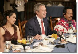 President George W. Bush participants in a breakfast meeting with Training, Internships and Scholarships (TIES) recipients Wednesday, March 14, 2007, in Merida, Mexico.  White House photo by Eric Draper