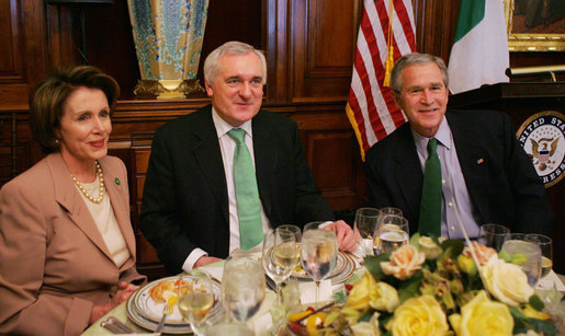 President George W. Bush joins Ireland’s Prime Minister Bertie Ahern, center, and House Speaker Nancy Pelosi, left, Thursday, March 15, 2007, during the annual St. Patrick’s Day luncheon at the U.S. Capitol. White House photo by Joyce Boghosian