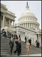 President George W. Bush waves as he leaves the U.S. Capitol with Ireland’s Prime Minister Bertie Ahern, House Speaker Nancy Pelosi, right, and Irish Foreign Minister Dermot Ahern, left, Thursday, March 15, 2007, following the annual St. Patrick’s Day luncheon at the U.S. Capitol. White House photo by Joyce Boghosian