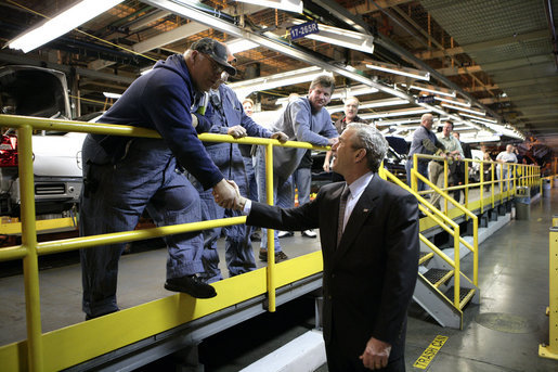 President George W. Bush shakes the hand of an employee at the General Motors Fairfax Assembly Plant Tuesday, March 20, 2007, in Fairfax, Kansas. White House photo by Eric Draper