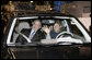 President George W. Bush sits in a hybrid Ford Escape with Barbara Neal, an employee of the Ford Motor Company - Kansas City Assembly Plant in Claycomo, Missouri Tuesday, March 20, 2007. The President took the opportunity to deliver remarks on Energy Initiatives during the Midwest stop. White House photo by Eric Draper