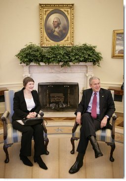 President George W. Bush and Prime Minister Helen Clark of New Zealand talk to reporters during their meeting in the Oval Office Wednesday, March 21, 2007. White House photo by Eric Draper