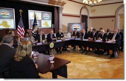 President George W. Bush takes part in a roundtable with Iraq provincial reconstruction team leaders in the Dwight D. Eisenhower Executive Office Building Thursday, March 22, 2007. "We have a remarkable country and we have people from different walks of life, different levels of experience make the decision to serve America by helping a young democracy survive," said the President to the press. "They understand what I understand, and that is success in Iraq is important for the security of the United States." White House photo by Joyce N. Boghosian