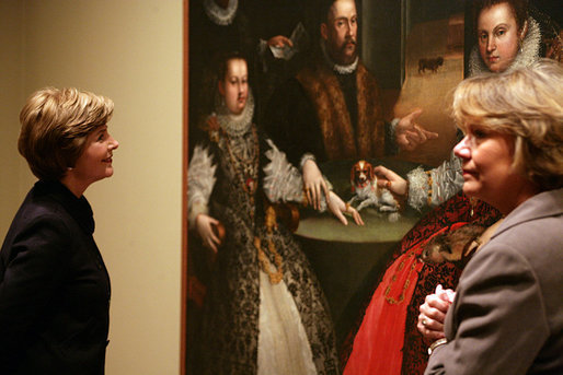 Mrs. Laura Bush takes a close look at a painting during tour an exhibit of Italian Women Artists from Renaissance to Baroque at the National Museum of Women in the Arts Thursday, March 22, 2007, in Washington, D.C. Also pictured is the museum's director Dr. Judy L. Larson. White House photo by Shealah Craighead