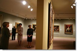 Mrs. Laura Bush and Mrs. Giovanni Castellaneta, wife of the Italian Ambassador to the United States, tour an exhibit of Italian Women Artists from Renaissance to Baroque at the National Museum of Women in the Arts Thursday, March 22, 2007, in Washington, D.C. They are guided by the museum's director Dr. Judy L. Larson, who is pictured at the far left. White House photo by Shealah Craighead