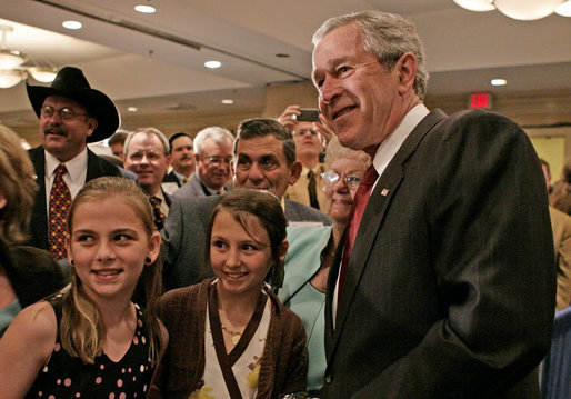 President George W. Bush poses for photos and meets guests following his remarks to the National Cattlemen’s Beef Association Wednesday, March 28, 2007 in Washington, D.C. White House photo by Joyce Boghosian