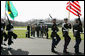 President George W. Bush and Mrs. Laura Bush welcome Brazilian President Luiz Inacio Lula da Silva Saturday, March 31, 2007 to Camp David, as a military honor guard passes in review. White House photo by Joyce Boghosian