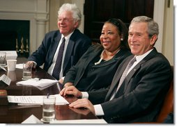 President George W. Bush talks with the press Thursday, April 12, 2007, after meeting about the No Child Left Behind Act with leaders in education, business the civil rights movement in the Roosevelt Room. Pictured with the President are Bill Taylor, Chairman of the Citizens' Commission on Civil Rights, and Shelia Evans-Tranumn, Associate Commissioner of Education for New York State. White House photo by Joyce N. Boghosian