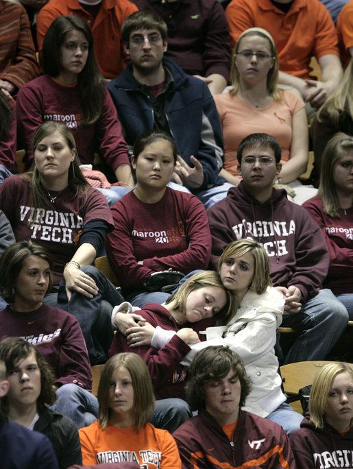 Students comfort each other during a Convocation on the Virginia Tech campus Tuesday, April 17, 2007, honoring the victims of a deadly shooting Monday. Thirty-three people, including the gunman, died in the rampage at the Blacksburg, Va. school. White House photo by Eric Draper