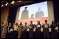 American citizens are sworn in during a special naturalization ceremony at the National Archives Tuesday, April 17, 2007, in Washington, D.C. Mrs. Cheney addressed the new citizens and presented each one with a copy of, “The Citizen’s Almanac,” a new book that highlights some of the most important historical symbols, decisions and documents in America’s history. 