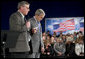 President George W. Bush bows his head Thursday, April 19, 2007, as Steve Bruns, President Emeritus of the Tipp City (Ohio) Chamber of Commerce, extends a moment of silence in memory of those killed in Monday's shootings at Virginia Tech. The President visited Ohio to deliver remarks on the global war on terror. White House photo by Eric Draper