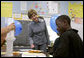 Mrs. Laura Bush watches a student demonstrate an experiment with static electricity and a balloon at the New Orleans Charter Science and Mathematics High School Thursday, April 19, 2007, in New Orleans, La. Originally created as a half-day program in 1992, the program reorganized itself as The New Orleans Charter Science and Mathematics High School after Hurricane Katrina sent the city’s school system into a state of crisis. White House photo by Shealah Craighead