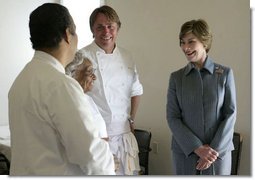 Mrs. Laura Bush talks with 93-year-old restaurant owner Willie Mae Seaton, center, her grandson Ronnie Seaton, Sr., left, and Chef John Besh of Restaurant August at Willie Mae’s Scotch House Thursday, April 19, 2007, in New Orleans, La. The restaurant was destroyed in Hurricane Katrina. White House photo by Shealah Craighead