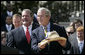 President George W. Bush shows the signed cowboy hat presented to him by Indianapolis Colts team owner and CEO Jim Irsay, left, during the White House ceremony to honor the Super Bowl champions Monday, April 23, 2007. White House photo by Eric Draper