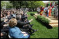 The audience takes part in a performance by the Kankouran West African Dance Company during a ceremony marking Malaria Awareness Day Wednesday, April 25, 2007, in the Rose Garden. White House photo by Eric Draper