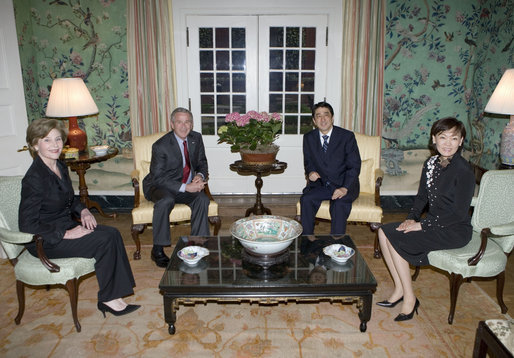 President George W. Bush and Mrs. Laura Bush meet with Japanese Prime Minister Shinzo Abe and his wife Mrs. Akie Abe Thursday, April 26, 2007, at the Blair House on Pennsylvania Avenue. Afterwards, the two couples walked to the White House for a social dinner. White House photo by Eric Draper