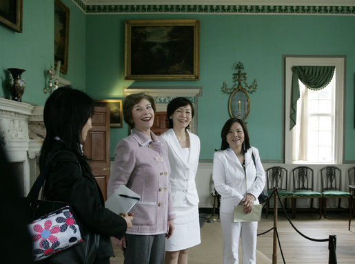 Mrs. Laura Bush and Mrs. Akie Abe, wife of Japanese Prime Minister Shinzo Abe, react to a humorous comment on their tour of the Mount Vernon Estate of George Washington Thursday, April 26, 2007, in Mount Vernon, Va. White House photo by Shealah Craighead