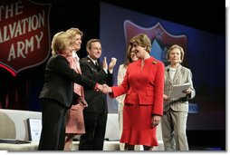 Mrs. Bush shakes hands with Marlene Klotz-Collins, National Advisory Board member, The Salvation Army, Friday, April 27, 2007, after delivering remarks during the Salvation Army’s National Advisory Organization Conference in Dallas, Texas. Also shown, from left, are Sally Sharp Harris, Programs, National Advisory Board Members, Ralph Bukowitz, Major, Community Relation & Development Secretary, Charlotte Anderson, NAOC Chairman, National Advisory Board Member, and Ruth Altshuler, National Advisory Board Member. White House photo by Shealah Craighead