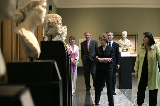 Mrs. Laura Bush walks through the Women of Antiquities exhibit Saturday, April 28, 2007, during a visit to the Getty Villa in Malibu, Calif. Mrs. Bush made the visit after delivering the commencement address to the 2007 graduates of Pepperdine University's Seaver College. She's joined by Dr. Karol Wight, right, Acting Curator of Antiquities at the J.Paul Getty Museum; Mrs. Louise Bryson, Chair of the J. Paul Getty Board of Trustees; Brad Freeman, second from left, longtime Bush family friend, and Dr. Michael Brand, Director of the J.Paul Getty Museum. White House photo by Shealah Craighead