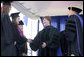 Mrs. Laura Bush congratulates the three Valedictorians of the 2007 graduating class at Pepperdine University's Seaver College Saturday, April 28, 2007, during commencement ceremonies on the Malibu, California campus. White House photo by Shealah Craighead