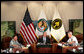 President George W. Bush joins Admiral William Fallon, right, Commander of the U.S. Central Command, and General Doug Brown, Commander U.S. Special Operations Command, during a visit Tuesday, May 1, 2007, to CENTCOM at MacDill Air Force Base in Tampa, Fla. White House photo by Eric Draper