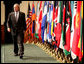 President George W. Bush walks on stage Tuesday, May 1, 2007, at Davis Conference Center at Tampa's MacDill Air Force Base, to deliver remarks to the CENTCOM Coalition Conference. White House photo by Eric Draper