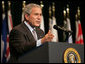  President George W. Bush delivers remarks Tuesday, May 1, 2007, to the CENTCOM Coalition Conference at MacDill Air Force Base in Tampa. Said the President, "These are difficult times. These are tough times. These are times that require hard work and courage and faith in the ability of liberty to yield the pace we want." White House photo by Eric Draper