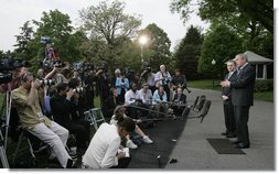 President George W. Bush and President Alvaro Uribe of Colombia, deliver statements Wednesday, May 2, 2007, on the South Lawn of the White House. In introducing President Uribe to the media, President Bush said, "It's been my honor to welcome a true democrat, a strong leader, and a friend."  White House photo by Joyce N. Boghosian