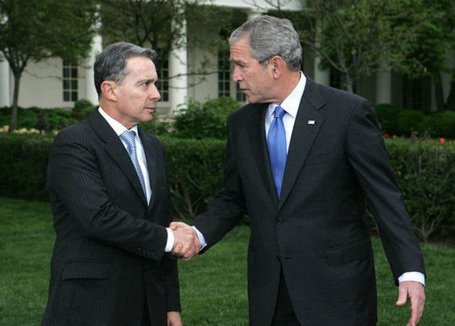 President George W. Bush and Colombia's President Alvaro Uribe exchange handshakes after delivering remarks Wednesday, May 2, 2007, on the South Lawn. President Uribe's visit underscores the friendship and extensive cooperation between the two countries. White House photo by Joyce Boghosian