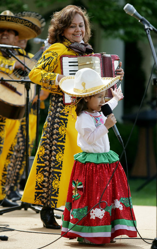 Performer Angelica Mora Arriaga, a member of the Los Hermanos Mora Arriaga mariachi band, performs with family members in the Rose Garden at the White House Friday, May 4, 2007, during a celebration of Cinco de Mayo. White House photo by Eric Draper