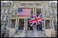 The Union Jack is raised next to the American flag Friday, May 4, 2007, at the Eisenhower Executive Office Building on the grounds of the White House in preparation for the visit Monday by Queen Elizabeth II and Prince Philip. White House photo by Lynden Steele