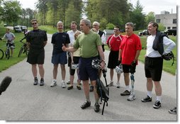 President George W. Bush stands with member of the President's Council on Physical Fitness and Sports as he addresses the press before a bike ride in Beltsville, Md., Saturday, May 5 , 2007. "Today I'm going to ride with a group of friends on a mountain bike," said the President in his remarks about May being Physical Fitness Month, "But the message to all Americans is to find time in your schedule to walk, run, swim, bike, to take care of yourselves." White House photo by Joyce N. Boghosian