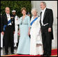 President George W. Bush and Mrs. Laura Bush welcome Her Majesty Queen Elizabeth II and His Royal Highness The Prince Philip, Duke of Edinburgh, Monday, May 7, 2007, upon their arrival to the North Portico of the White House for a State Dinner in their honor. White House photo by Eric Draper