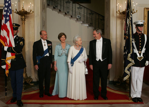 President George W. Bush and Mrs. Laura Bush escort Her Majesty Queen Elizabeth II and His Royal Highness The Prince Philip, Duke of Edinburgh, from the Grand Staircase of the White House Monday, May 7, 2007, prior to attending the State Dinner in the Queen's honor. White House photo by Lynden Steele