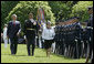 President George W. Bush and Her Majesty Queen Elizabeth II of Great Britain review the troops during a state arrival ceremony Monday, May 7, 2007. White House photo by Joyce Boghosian