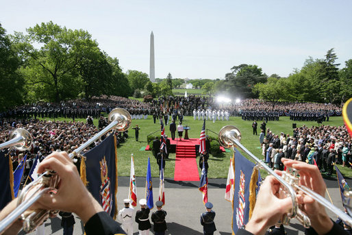 United States Army Band "Pershing's Own" Herald Trumpeters play from the South Portico Balcony Monday, May 7, 2007 during the state arrival ceremony for Her Majesty Queen Elizabeth of Britain and His Royal Highness the Prince Philip Duke of Edinburgh. Approximately 7000 guests attended the arrival ceremony held on the South Lawn of the White House. White House photo by David Bohrer