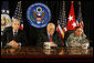 Vice President Dick Cheney is joined by U.S. Ambassador to Iraq Ryan Crocker, left, and General David Petraeus, Commander of U.S. forces in Iraq, right, for a press conference Wednesday, May 9, 2007, at the U.S. Embassy in Baghdad. In speaking about the day's meetings with Iraqi officials, the Vice President said, "I emphasized the importance of making progress on the issues before us, not only on the security issues but also on the political issues that are pending before the Iraqi government. I was impressed with the commitment on the part of the Iraqis to succeed on these tasks, to work together to solve these issues." White House photo by David Bohrer