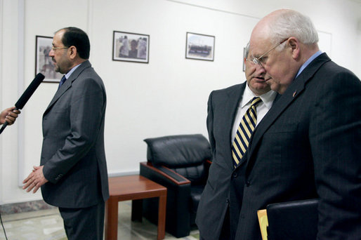 Following a meeting with Iraqi Prime Minister Nouri al-Maliki, Vice President Dick Cheney listens as an interpreter translates the Iraqi leader's remarks to the press Wednesday, May 9, 2007, in Baghdad. Earlier the Iraqi Prime Minister had said, "The meeting with the Vice President put the foundation for practical steps in order to support our efforts working on both the security front as well as the domestic political issues." White House photo by David Bohrer