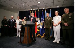 President George W. Bush responds to a reporter’s question following his meeting with Secretary of Defense Robert Gates and members of the Joint Chiefs of Staff Thursday, May 10, 2007, at the Pentagon in Arlington,Va. From left are: U.S. Army Chief of Staff Gen. George Casey; Air Force Chief of Staff Gen. Michael Moseley; Joint Chiefs Vice Chairman Navy Adm. Edmund Giambastiani; U.S. Defense Secretary Robert Gates; Joint Chiefs Chairman Gen. Peter Pace; Chief of Naval Operations Adm. Michael Mullen and Marine Corps Commandant Gen. James Conway.  White House photo by Eric Draper